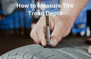 person measuring tire tread depth